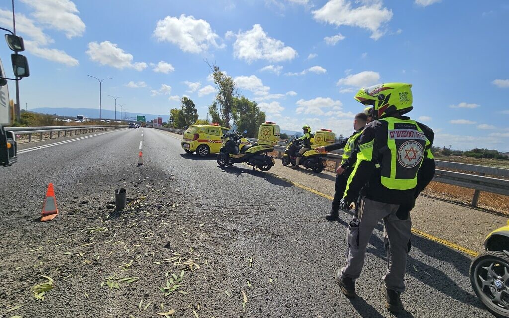 The scene of a rocket impact on Route 22 in the Haifa area, October 9, 2024. (Magen David Adom)
