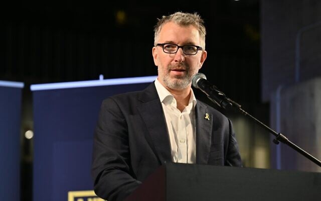 Simon Walters, British ambassador to Israel, speaks at an event in Tel Aviv marking one year since the October 7 Hamas terror onslaught, October 13, 2024. (Paulina Patimer / Hostages Families Forum)