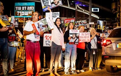 Relatives of the Hamas hostages protest outside the Kirya military headquarters in Tel Aviv ahead of a security cabinet meeting on October 20, 2024. (Oded Engel/ Pro-Democracy Protest Movement)