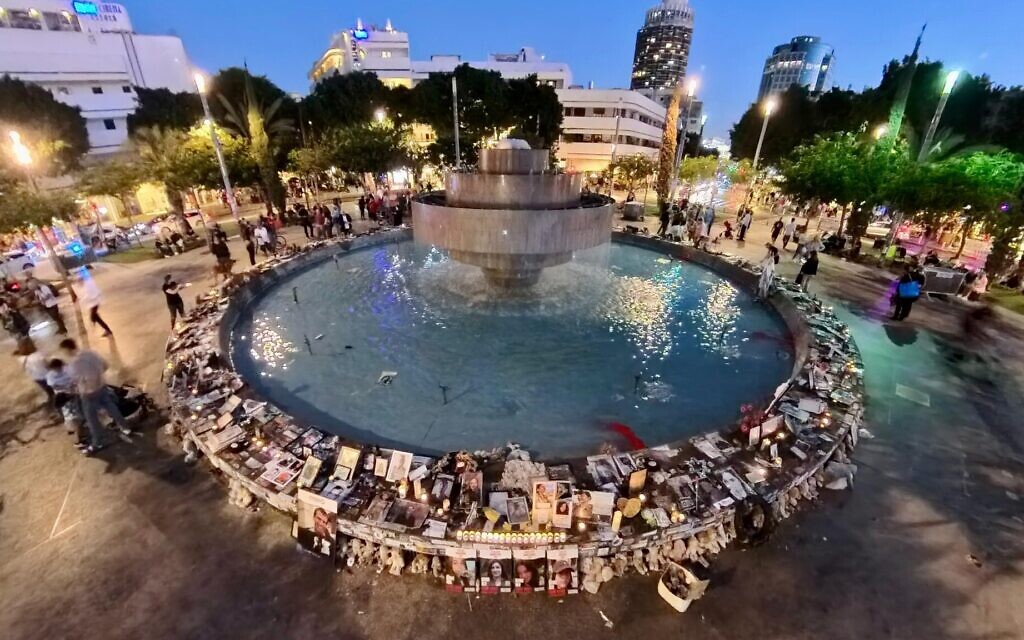 Photos of hostages held by Hamas in Gaza since October 7, 2023, on display at Tel Aviv's Dizengoff Square to mark the one year anniversary on the Jewish calendar of their abduction. (Pro-Democracy Movement/Sharon Ben-Porath)