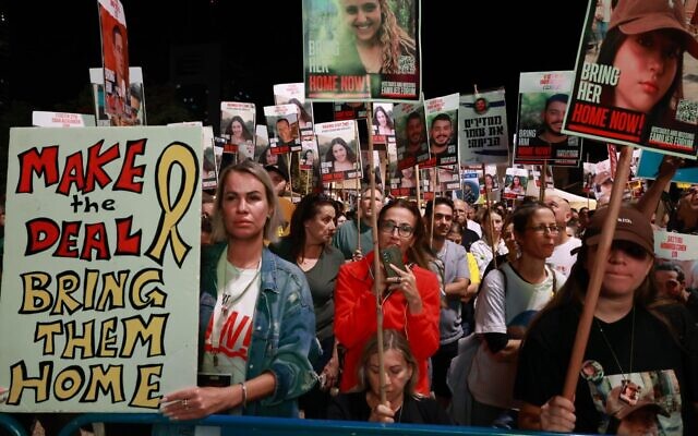 Protestors call for a deal to secure the release of hostage held in Gaza by the Hamas terror group, during a weekly protest in Hostages Square in Tel Aviv, October 26, 2024. (Dafna Yosha/ Pro-Democracy Protest Movement) Protestors call for a deal to secure the release of hostage held in Gaza by the Hamas terror group, during a weekly protest in Hostages Square in Tel Aviv, October 26, 2024. (Dafna Yosha/ Pro-Democracy Protest Movement)