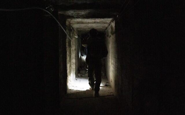 IDF troops inside a Hezbollah tunnel found in southern Lebanon for use by its elite Radwan force on way to invasion into Israel, in a photo released by the military on October 14, 2024. (Israel Defense Forces)