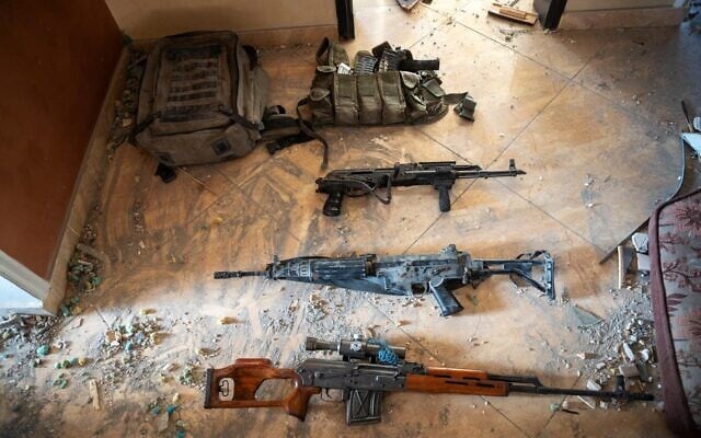 Weapons found in the house where Hamas leader Yahya Sinwar was killed in the southern Gaza Strip in an image released on October 18, 2024 (Israel Defense Forces) Weapons found in the house where Hamas leader Yahya Sinwar was killed in the southern Gaza Strip in an image released on October 18, 2024 (Israel Defense Forces)
