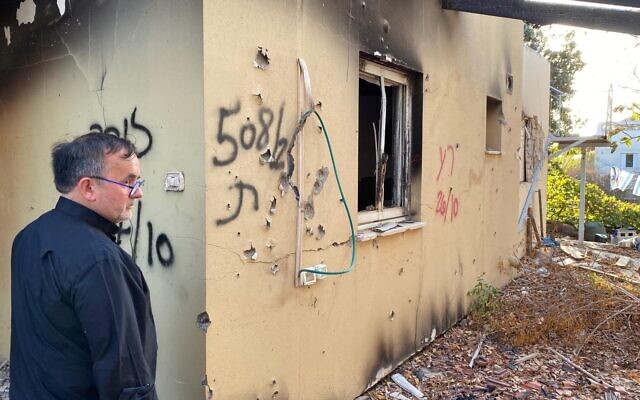 Father Patrick Desbois visits site of Hamas massacre at Kibbutz Be'eri for the one-year commemoration of the October 7, 2023, attacks, October 2024 (B'nai B'rith International)