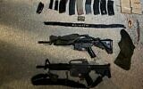 A handout photo released by the IDF on October 11, 2024, shows what the Israeli military says are guns and other items found on a pair of terrorists killed in an airstrike near Tulkarem a day earlier. (IDF Spokesperson)