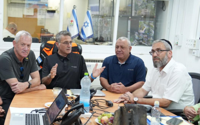 National Unity MKs Benny Gantz (L) and Gadi Eisenkot (2R) meet with Karmiel Mayor Moshe Koninsky (C) during a tour of the north on October 13, 2024 (Courtesy) National Unity MKs Benny Gantz (L) and Gadi Eisenkot (2R) meet with Karmiel Mayor Moshe Koninsky (C) during a tour of the north on October 13, 2024 (Courtesy)