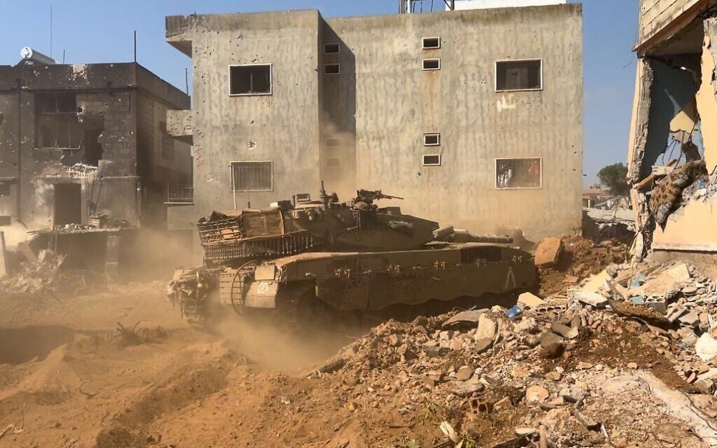 An IDF tank operates in southern Lebanon, October 10, 2024. (Lazar Berman/Times of Israel)