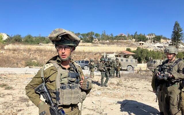 Col. Avi Marciano, the commander of the 769th 'Hiram' Regional Brigade, leads a group of journalists into Lebanon on October 28, 2024. (Diana Bletter/Times of Israel)