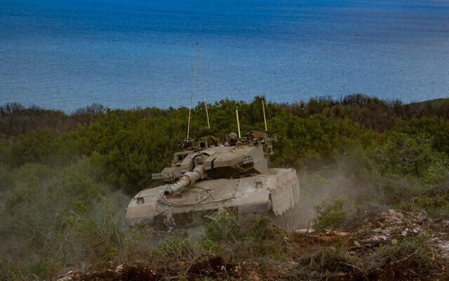 An Israeli armored vehicle maneuvers near the coast in southern Lebanon, in a picture released by the military on October 21, 2024. (IDF Spokesperson) An Israeli armored vehicle maneuvers near the coast in southern Lebanon, in a picture released by the military on October 21, 2024. (IDF Spokesperson)