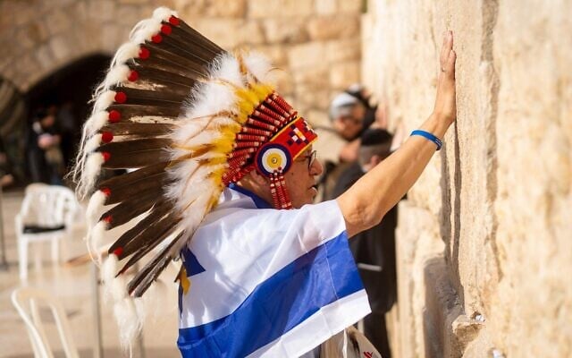 Harvey Yesno, a Grand Chief of the Ojibwe tribe from Canada, praying at the Western Wall on October 28, 2024, during a visit organized by the Indigenous Embassy in Jerusalem (Perry Trotter/IEJ, Courtesy)