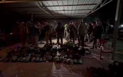 Israeli troops near the northern border, in a still from footage released by the IDF on October 1, 2024 (IDF Spokesman)