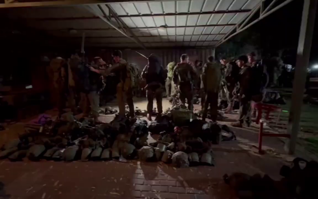 Israeli troops near the northern border, in a still from footage released by the IDF on October 1, 2024 (IDF Spokesman)