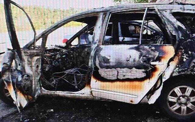 A car allegedly set on fire by a group of East Jerusalem men suspected of carrying out espionage missions on behalf of Iran, in an image published October 22, 2024. (Israel Police) A car allegedly set on fire by a group of East Jerusalem men suspected of carrying out espionage missions on behalf of Iran, in an image published October 22, 2024. (Israel Police)