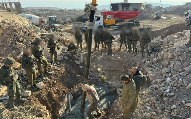 Concrete is pumped into a Hezbollah tunnel in southern Lebanon, in a handout photo issued by the IDF on November 10, 2024. (Israel Defense Forces)