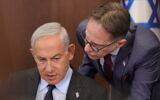 Prime Minister Benjamin Netanyahu (left) speaks with Cabinet Secretary Tzachi Braverman (right) during a weekly cabinet meeting in the Prime Minister's Office in Jerusalem on April 30, 2023. (Abir Sultan/Pool/AFP)