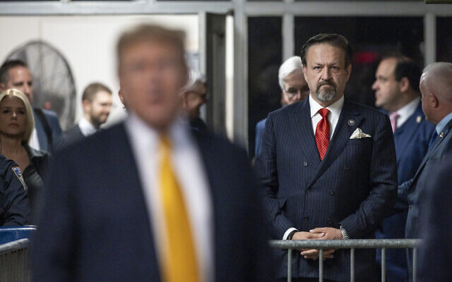 Former Trump White House advisor Sebastian Gorka (R) watches as former-US president and then-Republican presidential candidate Donald Trump speaks to the press during a break in his trial for allegedly covering up hush money payments linked to extramarital affairs, at Manhattan Criminal Court in New York City, on May 21, 2024. (Justin Lane/Pool/AFP) Former Trump White House advisor Sebastian Gorka (R) watches as former-US president and then-Republican presidential candidate Donald Trump speaks to the press during a break in his trial for allegedly covering up hush money payments linked to extramarital affairs, at Manhattan Criminal Court in New York City, on May 21, 2024. (Justin Lane/Pool/AFP)