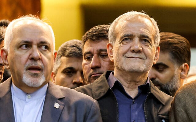 Iran's President Masoud Pezeshkian (R) and former foreign minister Mohammad Javad Zarif visit Ayatollah Ruhollah Khomeini's shrine in the south of Tehran on July 6, 2024. (Atta Kenare/AFP) Iran's President Masoud Pezeshkian (R) and former foreign minister Mohammad Javad Zarif visit Ayatollah Ruhollah Khomeini's shrine in the south of Tehran on July 6, 2024. (Atta Kenare/AFP)