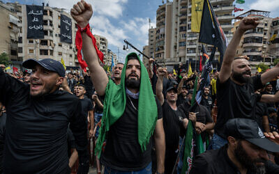 Illustrative: Shiite Muslims take part in a ceremony during the peak of Ashura, a 10-day period commemorating the 7th century killing of Prophet Mohammed's grandson Imam Hussein, in Beirut on July 17, 2024. (Khaled Desouki / AFP)