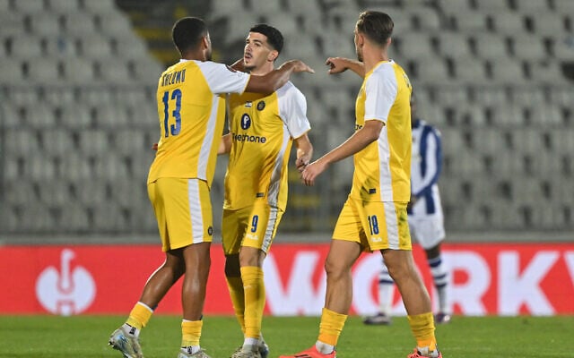 Maccabi Tel Aviv's Israeli midfielder #09 Dor David Turgeman (C) celebrates with teammates after scoring his team's first goal during the UEFA Europa League, League Phase - Matchday 3, football match between Maccabi Tel-Aviv FC and Real Sociedad at the Partizan Stadium in Belgrade on October 24, 2024. (Andrej ISAKOVIC / AFP) Maccabi Tel Aviv's Israeli midfielder #09 Dor David Turgeman (C) celebrates with teammates after scoring his team's first goal during the UEFA Europa League, League Phase - Matchday 3, football match between Maccabi Tel-Aviv FC and Real Sociedad at the Partizan Stadium in Belgrade on October 24, 2024. (Andrej ISAKOVIC / AFP)
