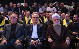 Then-deputy chief of the Lebanese Hezbollah terror group Naim Qassem (R) attends a commemoration ceremony alongside former finance minister Ali Hassan Khalil (C) and Iran's Ambassador in Lebanon Mojtaba Amani, at the memorial grave of slain Hezbollah commander Imad Mughniyeh on April 5, 2024. (Anwar Amro/AFP)