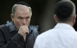 Argentina's ambassador to the US, Gerardo Werthein, vapes during a Hanukkah event in Buenos Aires on December 12, 2023. (Juan Mabromata/AFP)