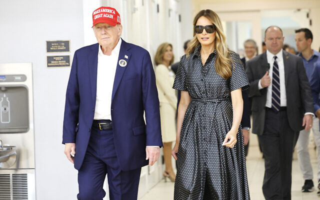 Republican presidential nominee former President Donald Trump and his wife Melania Trump depart after casting their votes at a polling place in the Morton and Barbara Mandel Recreation Center on Election Day, on November 05, 2024 in Palm Beach, Florida. (Chip Somodevilla/Getty Images/AFP)