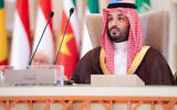 A handout picture provided by the Saudi Press Agency SPA on November 11, 2024, shows Saudi Crown Prince Mohammed bin Salman addressing the joint extraordinary leaders summit of the Organization of Islamic Cooperation (OIC) and the Arab League in Riyadh. (Photo by Ahmed NURELDINE / SPA / AFP)