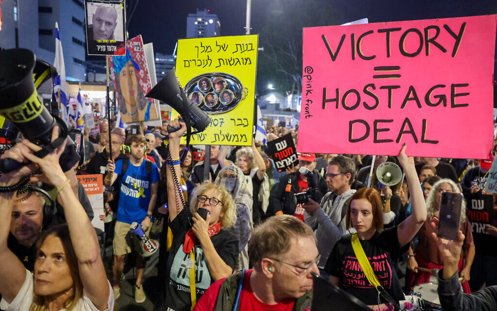 Demonstrators rally against the government and call for release of Israelis held hostage in Gaza by Hamas, in front of the Defense Ministry in Tel Aviv on November 16, 2024. (Jack Guez/AFP)