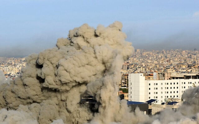 Thick smoke rises from an explosion during an Israeli airstrike that targeted Hezbollah in Beirut's southern suburbs on November 17, 2024 (AFP)