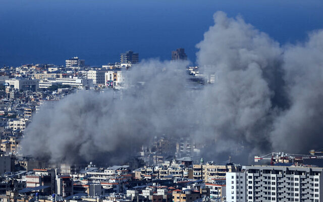 Smoke rises from the site of an Israeli airstrike that targeted Beirut's southern suburbs on November 21, 2024, as the war between Israel and Hezbollah continues. (Photo by IBRAHIM AMRO / AFP) Smoke rises from the site of an Israeli airstrike that targeted Beirut's southern suburbs on November 21, 2024, as the war between Israel and Hezbollah continues. (Photo by IBRAHIM AMRO / AFP)