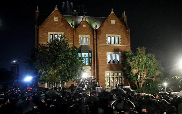 Mourners attend the funeral of Israeli-Moldovan rabbi Zvi Kogan in Kfar Chabad, a community in central Israel, on November 25, 2024. (GIL COHEN-MAGEN / AFP) Mourners attend the funeral of Israeli-Moldovan rabbi Zvi Kogan in Kfar Chabad, a community in central Israel, on November 25, 2024. (GIL COHEN-MAGEN / AFP)