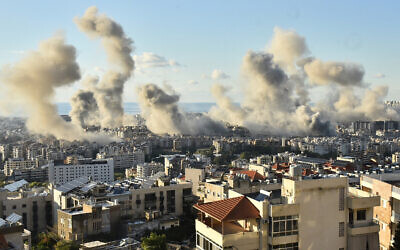 Smoke billows above Beirut's southern suburbs following Israeli airstrikes on November 26, 2024. (Fadel Itani/AFP)