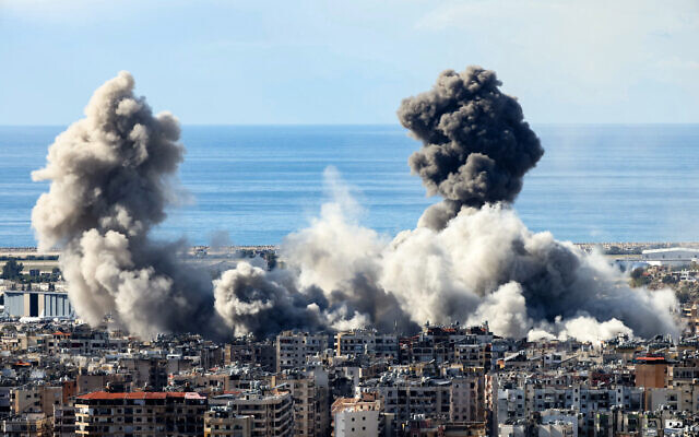 Smoke rises from the site of an Israeli airstrike that targeted Hezbollah in Beirut's southern suburbs on November 26, 2024 (IBRAHIM AMRO / AFP) Smoke rises from the site of an Israeli airstrike that targeted Hezbollah in Beirut's southern suburbs on November 26, 2024 (IBRAHIM AMRO / AFP)