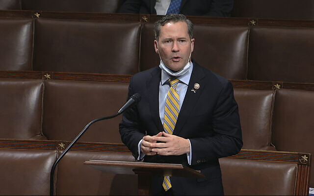 In this image from video, Rep. Michael Waltz, R-Fla., speaks on the floor of the House of Representatives at the U.S. Capitol in Washington, Thursday, April 23, 2020. (House Television via AP)