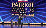 Pete Hegseth hosts the Fox Nation's Patriot Awards, in Nashville, Tennessee, November 16, 2023. (George Walker IV/AP)