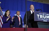 Republican US presidential candidate former president Donald Trump, center, and Rep. Elise Stefanik, left, listen as former Rep. Lee Zeldin speaks at a campaign event in Concord, New Hampshire, January 19, 2024. (AP Photo/Matt Rourke)