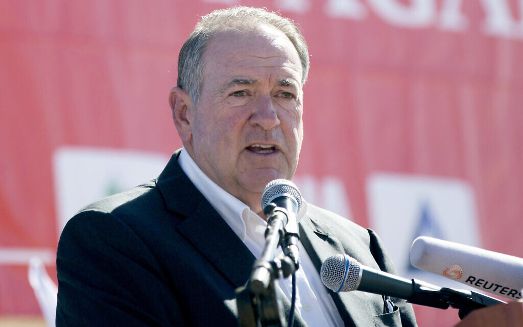 Arkansas Governor Mike Huckabee speaks to the media in the West Bank settlement of Efrat, August 1, 2018. (AP Photo/Oded Balilty, File)