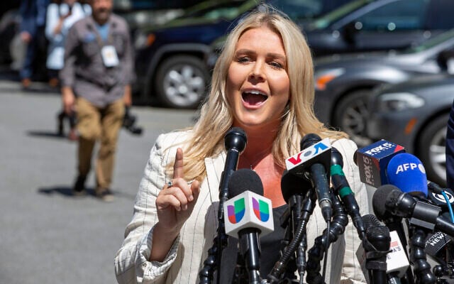 Karoline Leavitt, Donald Trump's campaign press secretary, speaks to the news media across the street from Trump's criminal trial in New York, May 28, 2024. (AP Photo/Ted Shaffrey) Karoline Leavitt, Donald Trump's campaign press secretary, speaks to the news media across the street from Trump's criminal trial in New York, May 28, 2024. (AP Photo/Ted Shaffrey)