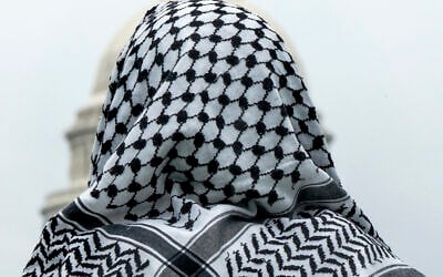 FILE - A man wearing a keffiyeh looks at the US Capitol during a pro-Palestinian, anti-Israel rally, on May 18, 2024, on the National Mall in Washington. (AP Photo/Jacquelyn Martin, File) FILE - A man wearing a keffiyeh looks at the US Capitol during a pro-Palestinian, anti-Israel rally, on May 18, 2024, on the National Mall in Washington. (AP Photo/Jacquelyn Martin, File)