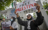 Civil society members shout slogans during a protest against Israel outside the UN office on the first anniversary of Hamas's October 7, 2023 attack, in Colombo, Sri Lanka, October 7, 2024. (AP Photo/Eranga Jayawardena)