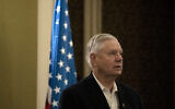 US Senator Lindsey Graham makes remarks to journalists in Jerusalem, October 8, 2024. (AP/ Maya Alleruzzo)