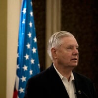 US Senator Lindsey Graham makes remarks to journalists in Jerusalem, October 8, 2024. (AP/ Maya Alleruzzo)