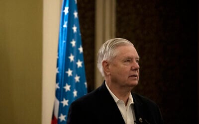 US Senator Lindsey Graham makes remarks to journalists in Jerusalem, October 8, 2024. (AP/ Maya Alleruzzo)