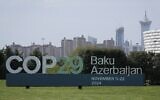 A sign for COP29, the United Nations Climate Change Conference, goes on display in Baku, Azerbaijan, September 16, 2024. (AP Photo/Sergei Grits)
