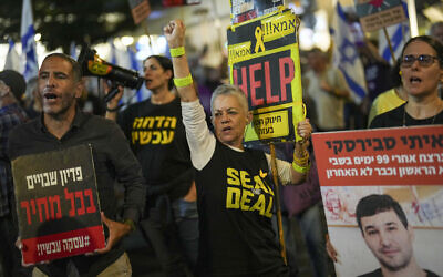 Relatives of hostages held by Hamas in the Gaza Strip and their supporters attend a rally calling for their immediate release in Tel Aviv, Israel, Saturday, November 2, 2024. (AP/Francisco Seco)