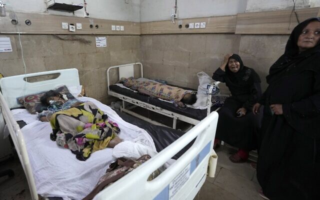 A woman, center, weeps as patients of heatstroke receive treatment at a hospital in Karachi, Pakistan, June 25, 2024. (AP Photo/Fareed Khan, File) A woman, center, weeps as patients of heatstroke receive treatment at a hospital in Karachi, Pakistan, June 25, 2024. (AP Photo/Fareed Khan, File)