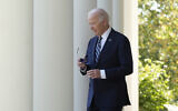 US President Joe Biden walks to speak in the Rose Garden of the White House in Washington, November 7, 2024. (AP Photo/Mark Schiefelbein)