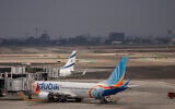A Fly Dubai plane is parked on the tarmac at Ben Gurion International Airport, near Lod, November 10, 2024. (AP Photo/ Ohad Zwigenberg)