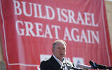 Then-Gov. Mike Huckabee, R-Ark., takes questions from the media, prior to laying a brick at a new housing complex in the West Bank settlement of Efrat, August 1, 2018. (AP Photo/Oded Balilty, File)