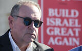 Mike Huckabee takes questions from the media, prior to laying a brick at a new housing complex in the West Bank settlement of Efrat, Aug. 1, 2018. President-elect Donald Trump will nominate former Arkansas Gov. Mike Huckabee as ambassador to Israel. (AP Photo/Oded Balilty, File)